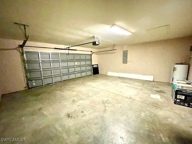 garage featuring a garage door opener, electric panel, and water heater