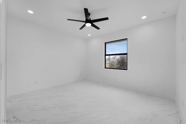 empty room featuring ceiling fan