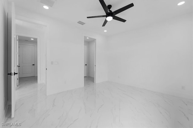 unfurnished room featuring ceiling fan