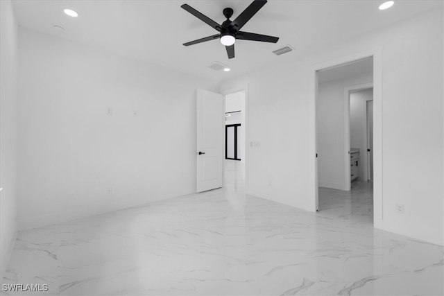 unfurnished room with ceiling fan