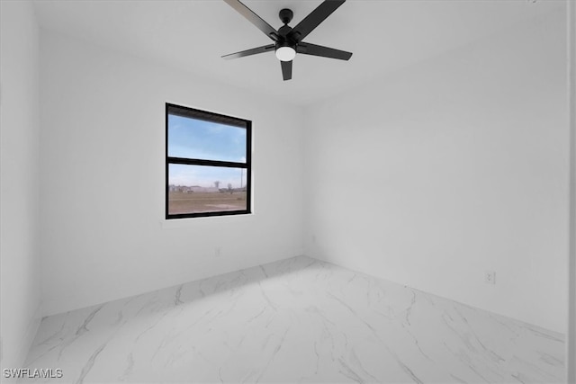 spare room featuring ceiling fan