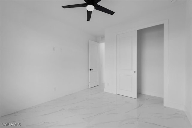 unfurnished bedroom featuring ceiling fan