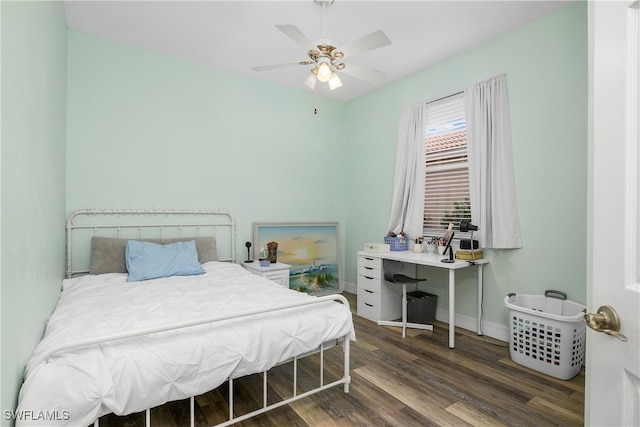 bedroom with dark wood-type flooring and ceiling fan