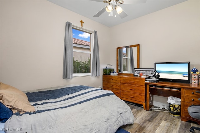 bedroom featuring ceiling fan and light wood-type flooring