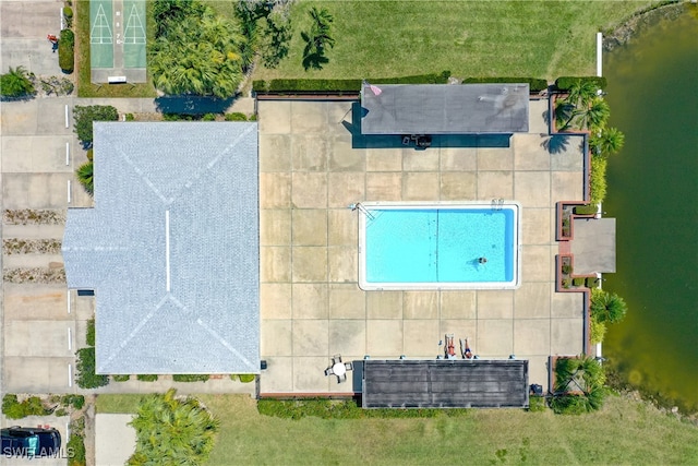 drone / aerial view with a water view