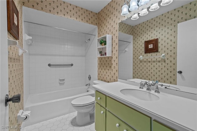 full bath with tile patterned floors, wallpapered walls, toilet, shower / washtub combination, and vanity