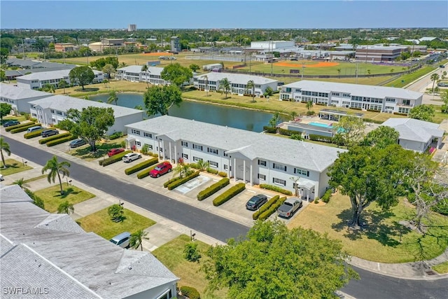 birds eye view of property featuring a water view