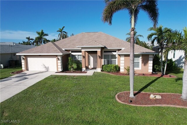 view of front facade featuring a garage and a front yard