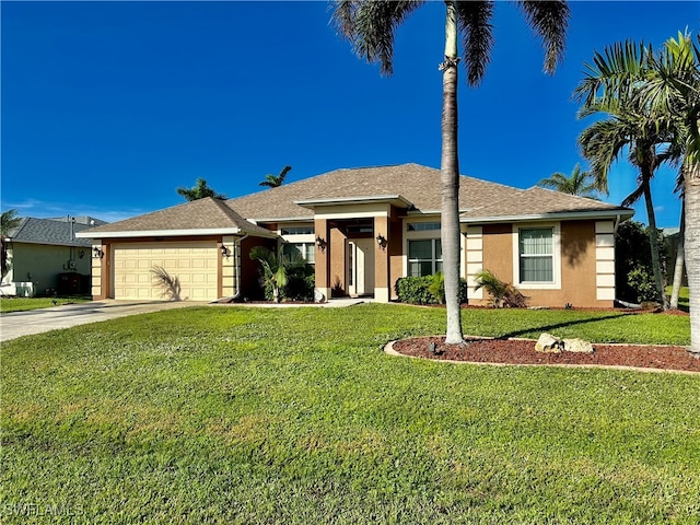 ranch-style house with a garage and a front yard