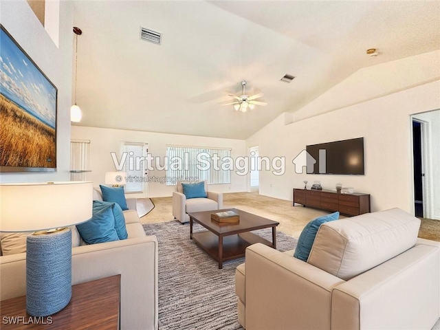 living room featuring ceiling fan, high vaulted ceiling, and carpet