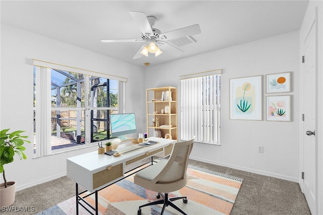 office space featuring carpet floors and ceiling fan