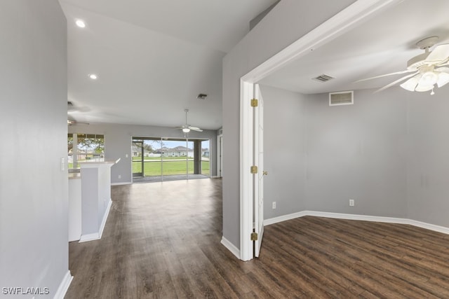 hallway featuring dark wood-type flooring