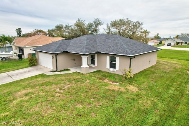 single story home featuring a garage and a front lawn