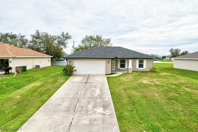 ranch-style home with a garage and a front lawn