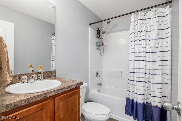 full bathroom with toilet, vanity, and shower / bath combination with curtain