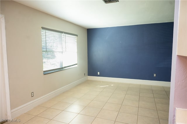 view of tiled spare room