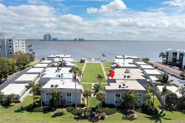 drone / aerial view with a water view