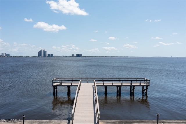 dock area featuring a water view