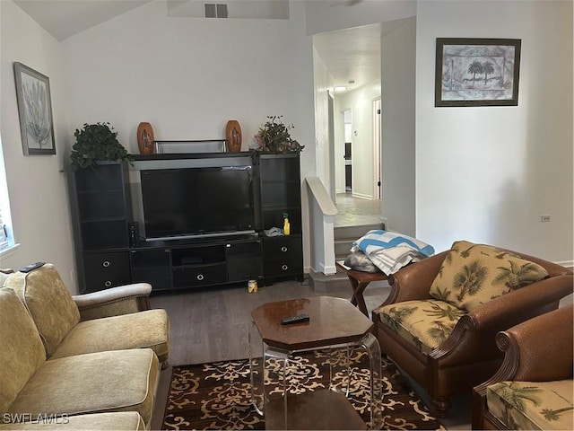 living room with lofted ceiling