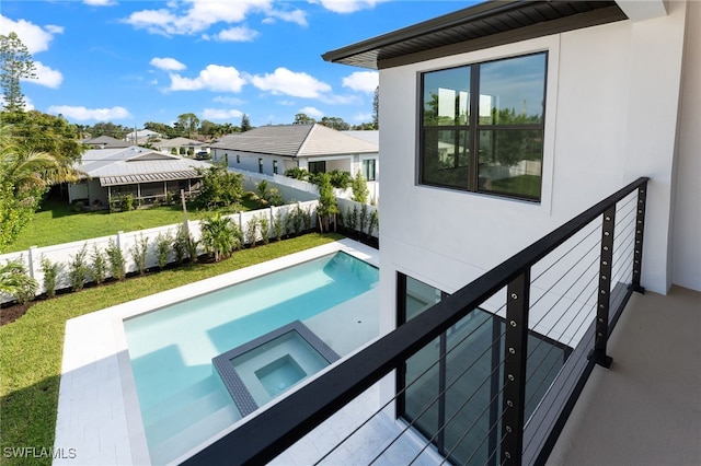 view of pool featuring an in ground hot tub