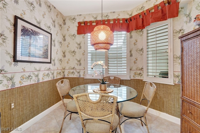 dining space with tile patterned floors