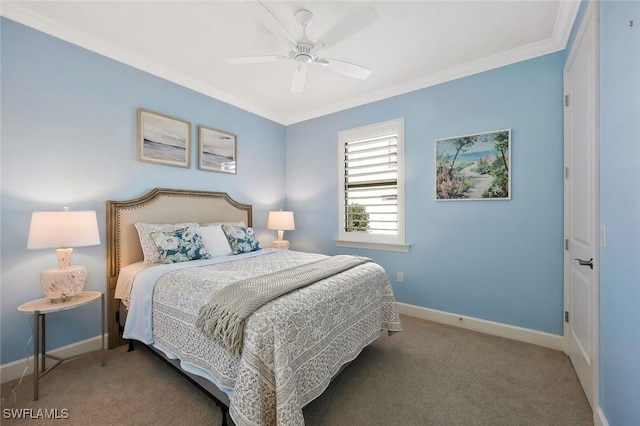 carpeted bedroom with ornamental molding, ceiling fan, and baseboards