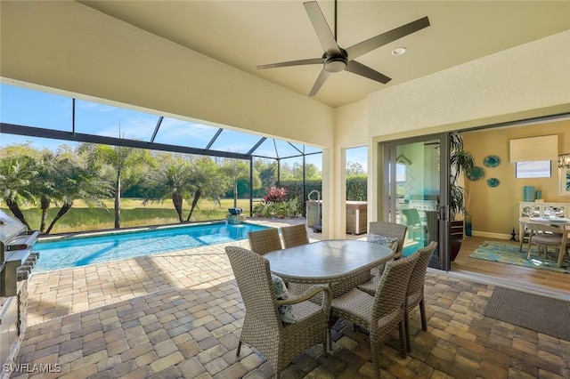 exterior space featuring ceiling fan