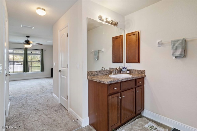 bathroom with vanity and ceiling fan