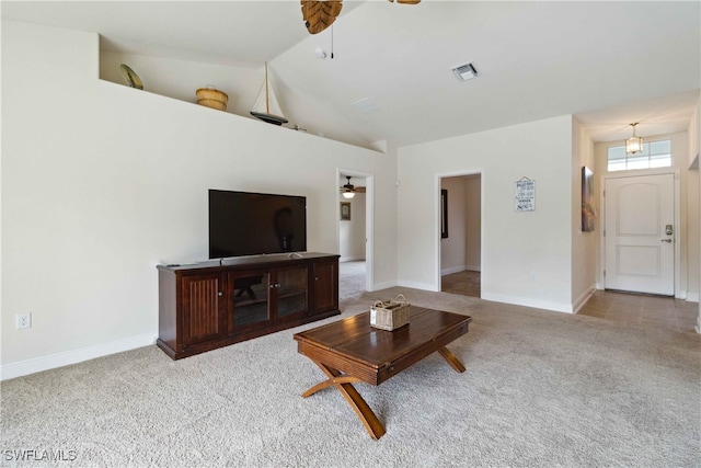 living room featuring light colored carpet, high vaulted ceiling, and ceiling fan