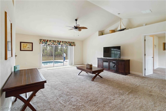 carpeted living room featuring ceiling fan and high vaulted ceiling