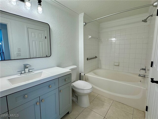 full bathroom with tiled shower / bath, a textured ceiling, toilet, vanity, and crown molding