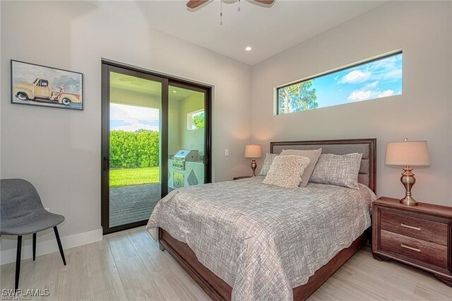 bedroom featuring light hardwood / wood-style flooring, multiple windows, access to outside, and ceiling fan