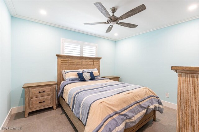 bedroom featuring ceiling fan and ornamental molding