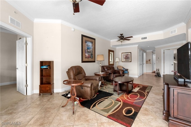 living room with a textured ceiling, light tile patterned floors, ceiling fan, and crown molding