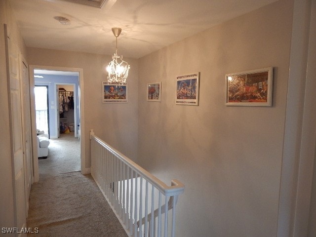 corridor with carpet floors