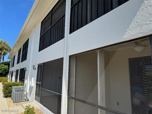 view of side of property featuring cooling unit