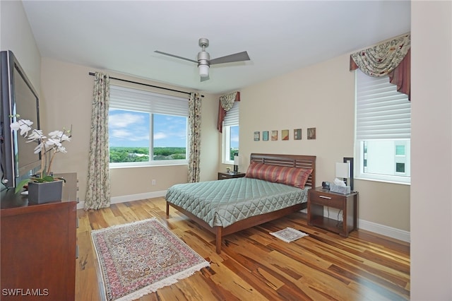 bedroom featuring ceiling fan and light wood-type flooring