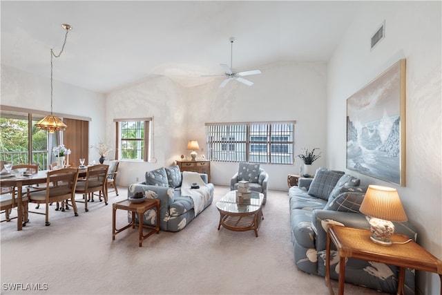 living room featuring high vaulted ceiling, ceiling fan, and carpet floors