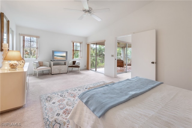 carpeted bedroom featuring ceiling fan, vaulted ceiling, and access to outside