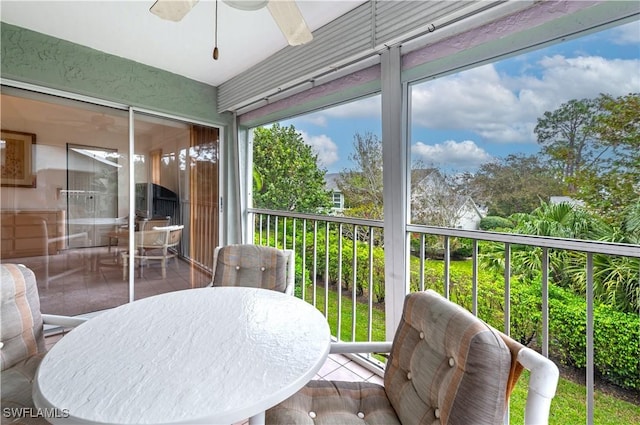 2141 Tama Cir Unit 202, Naples, FL 34112 - sunroom / solarium featuring ceiling fan and outdoor dining space