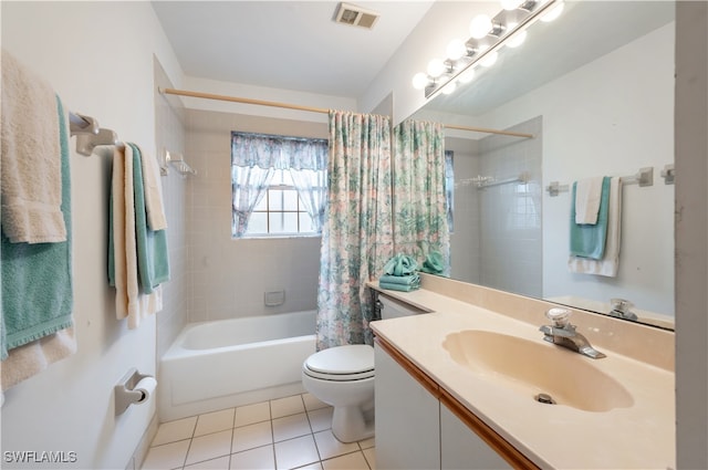 full bathroom with tile patterned flooring, vanity, shower / bath combination with curtain, and toilet