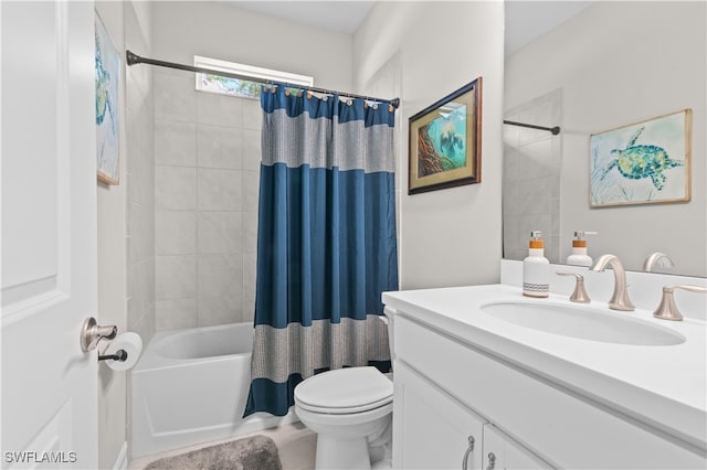 full bathroom featuring vanity, toilet, and shower / bath combination with curtain