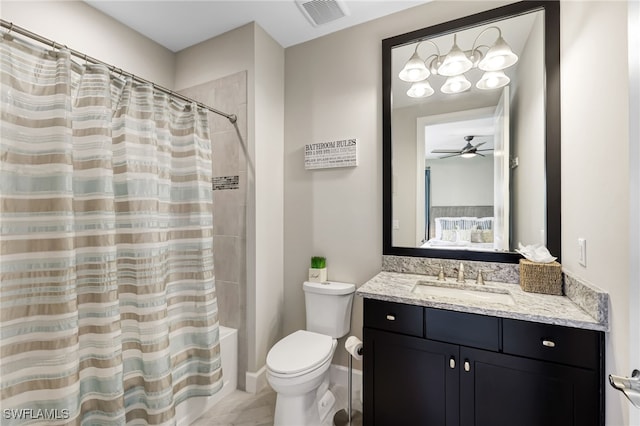 full bathroom featuring ceiling fan, shower / bath combination with curtain, toilet, and vanity