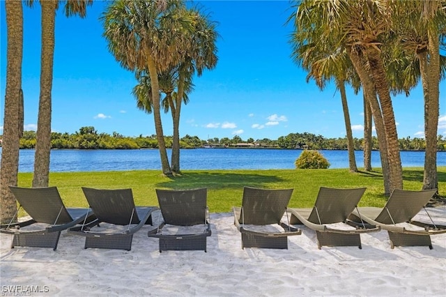 view of patio with a water view