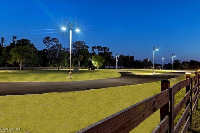 view of home's community featuring a lawn