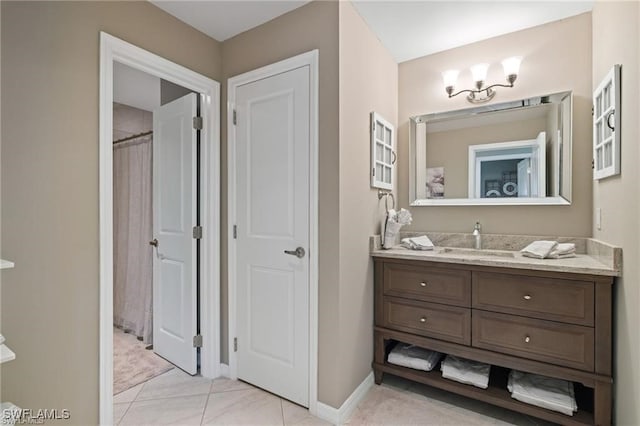 bathroom featuring vanity, a shower with curtain, and tile patterned flooring