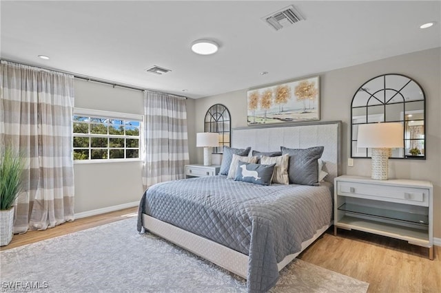 bedroom featuring light wood-type flooring