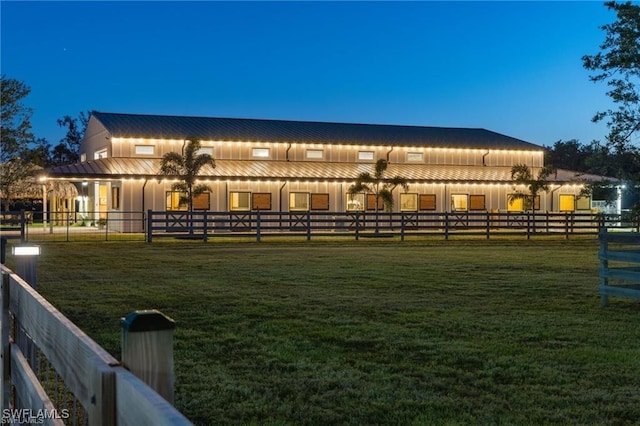 view of yard at dusk