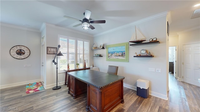 office featuring dark wood-type flooring, ceiling fan, and crown molding