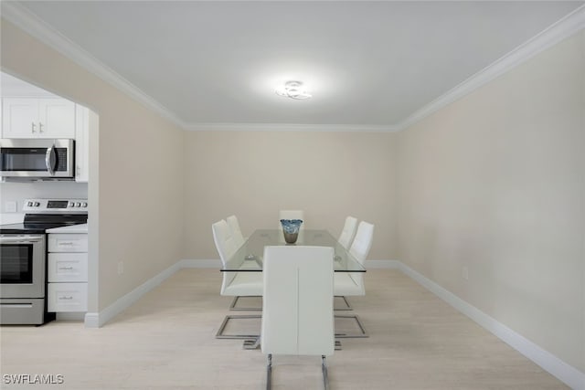 dining room with ornamental molding